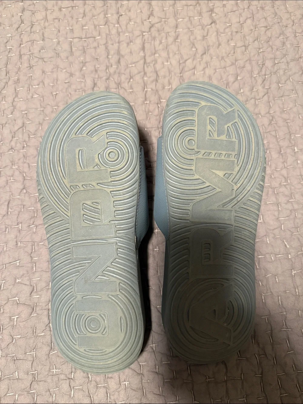 Under Armour Kids Slide Sandals in Light Gray with Orange Logo